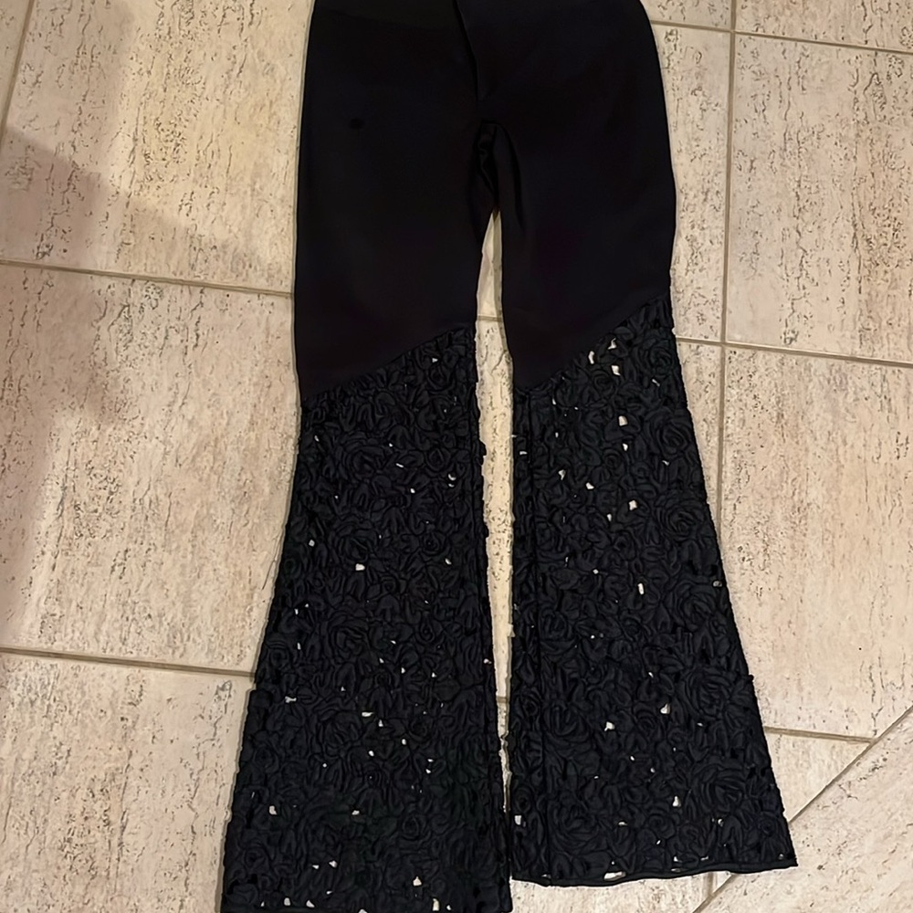 Alice & Olivia black cutout flare pants. Beautiful stylish and timeless. - Picture 5 of 5